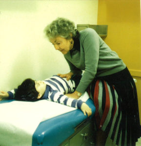Dr. Audrey Evans examining a child at the hospital