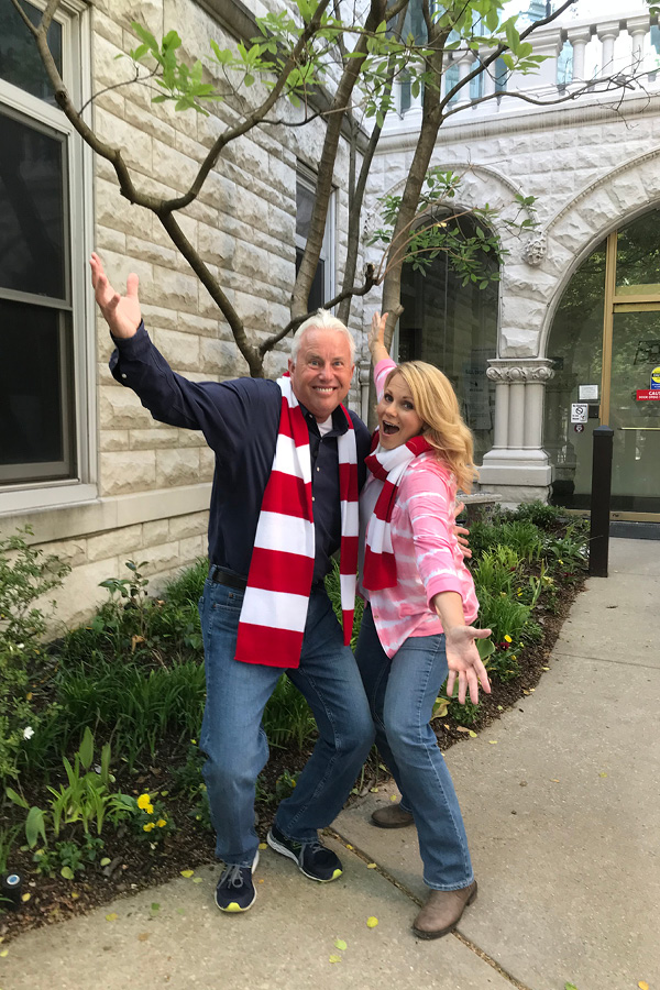 Small Town Big Deal hosts wearing Show Your Stripes scarves