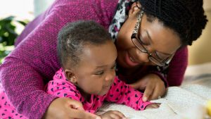 Mother playing with her daughter