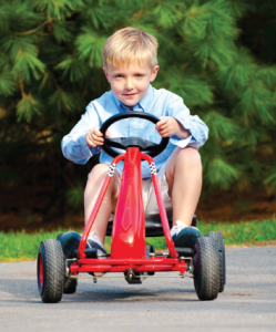 Child riding toy car