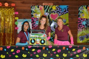 RMC Counselors dressed up in 80s outfits