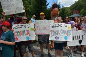 Counselors welcoming campers to RMC