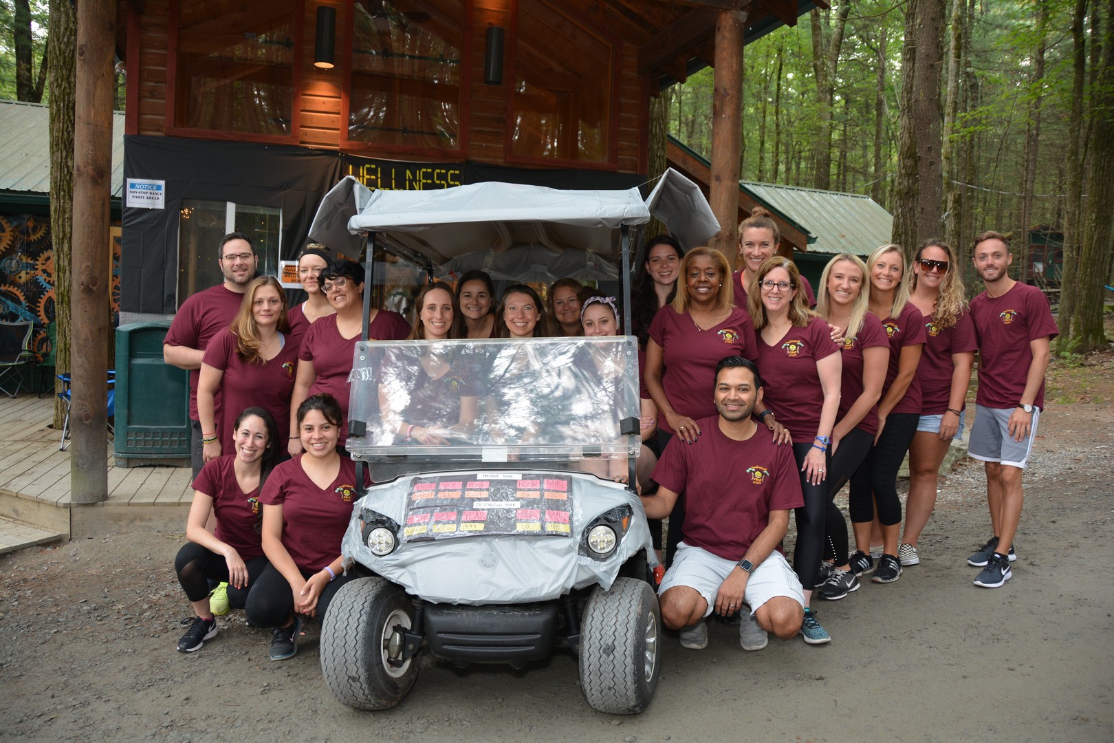 DSC_6040 2019 RMC Counselors posing by a golf cart