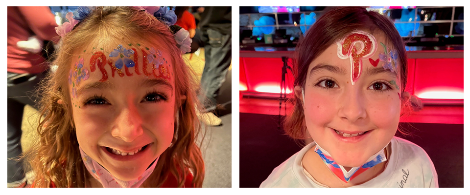 two girls with Phillies face paint