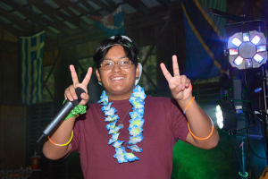 camp counselor giving peace signs